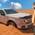 truck out of the sand