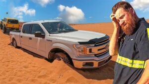 truck out of the sand